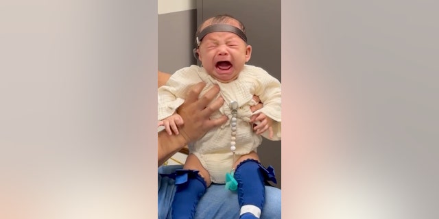 Baby hears for the first time