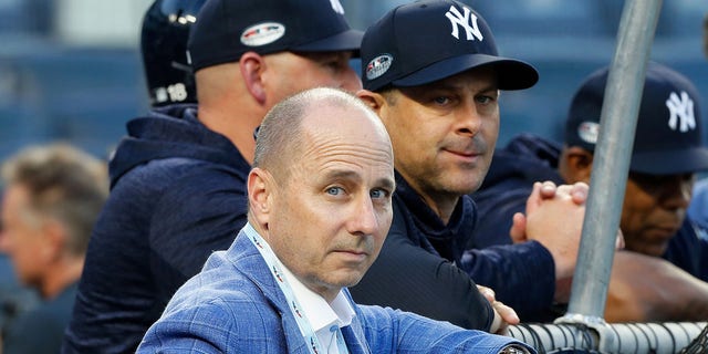 Brian Cashman and Aaron Boone