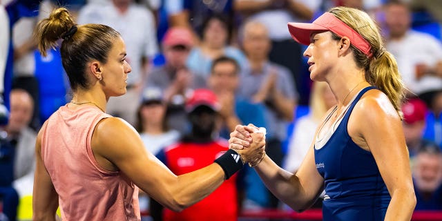 Collins and Sakkari shake hands