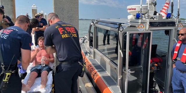 Florida Man Saved At Sea By Coast Guard From Partially Submerged Boat ...