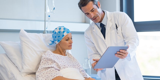 Doctor with cancer patient