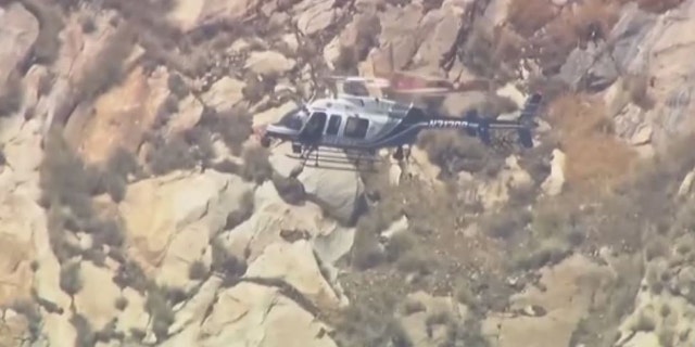 helicopter searching mountain