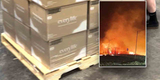 Picture of diapers on a crate prepared for shipping with an inset of a picture of the wildfire