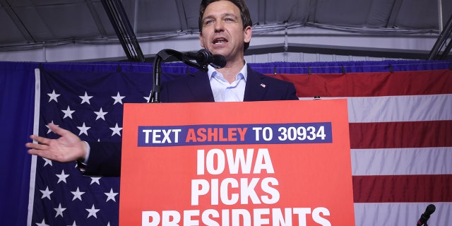 Republican presidential candidate Florida Governor Ron DeSantis speaks at podium in Iowa