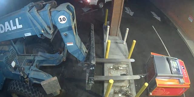 Forklift knocking over ATM