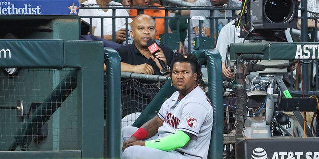 Jose Ramirez watches from the dugout