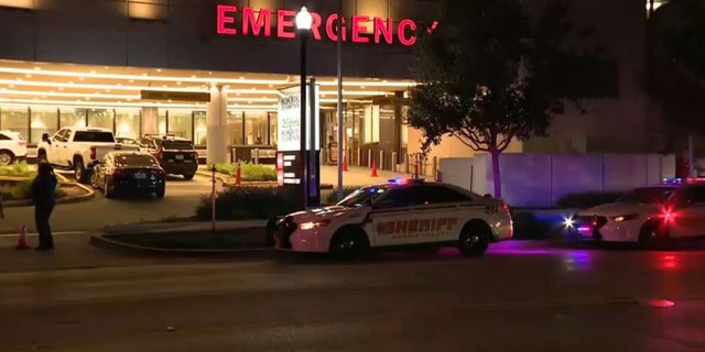 sheriff's vehicles outside hospital
