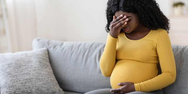 Pregnant woman suffering