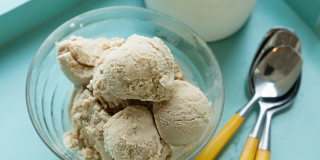 Vanilla ice cream with spoons