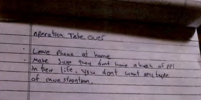 Negasi Zuberi's notes on lined paper