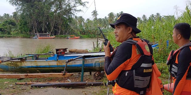 rescuers search in Indonesia