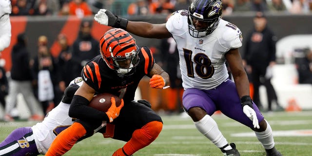 Ja'Marr chase gets tackled in an NFL game