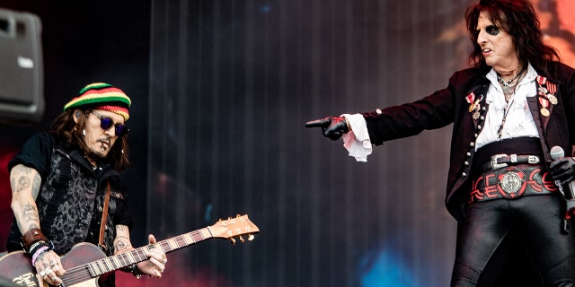 Alice Cooper playing with Johnny Depp