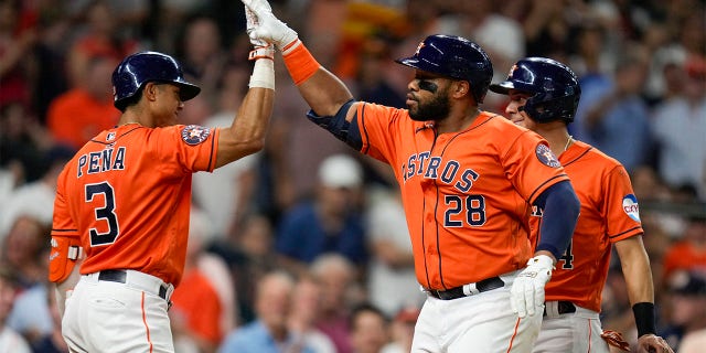 Jon Singleton celebrates a home run