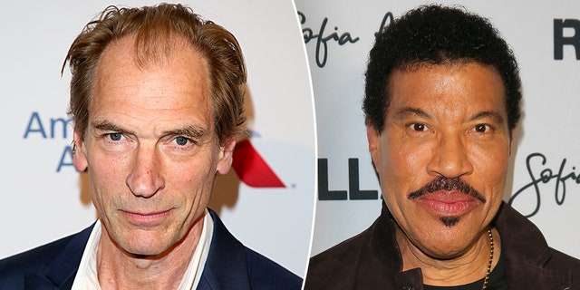 Julian Sands in a white shirt and navy jacket on the carpet split Lionel Richie in a brown jacket on the carpet