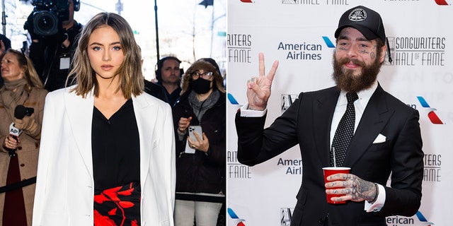 Leni Klum in a white blazer, red and black skirt and black shirt posing for a picture split Post Malone in a black suit and tie and black hat giving the peace sign on the carpet