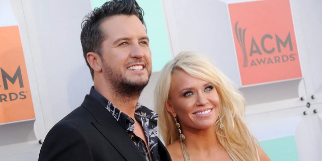 Luke Bryan poses for a photo with wife Caroline Boyer
