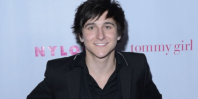 Mitchel Musso wears all black on red carpet