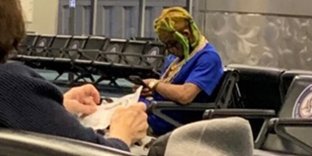 photo of brian moore sitting in atlanta airport taken by dea