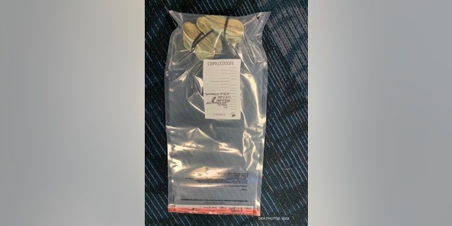 $8500 in an evidence bag after dea seized it from brian moore