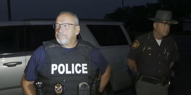 London police Chief Glenn Nicol in bulletproof vest at hostage scene