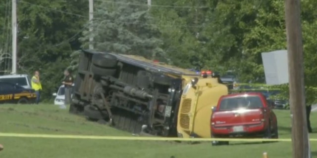 school bus on side