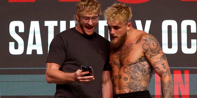 Jake and Logan Paul at weigh in