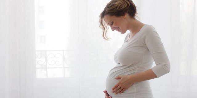 pregnant woman smiling