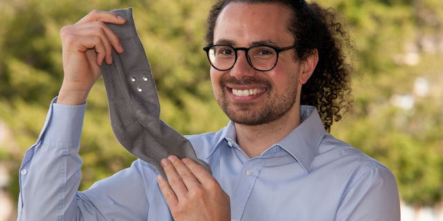 SmartSocks exec holding up company product