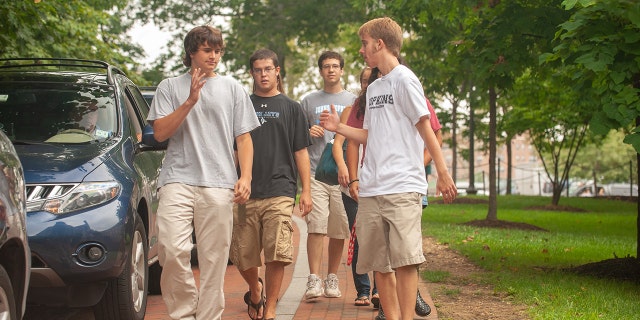 Students walking around college campus