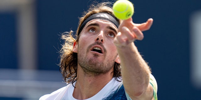 Stefanos Tsitsipas about to serve