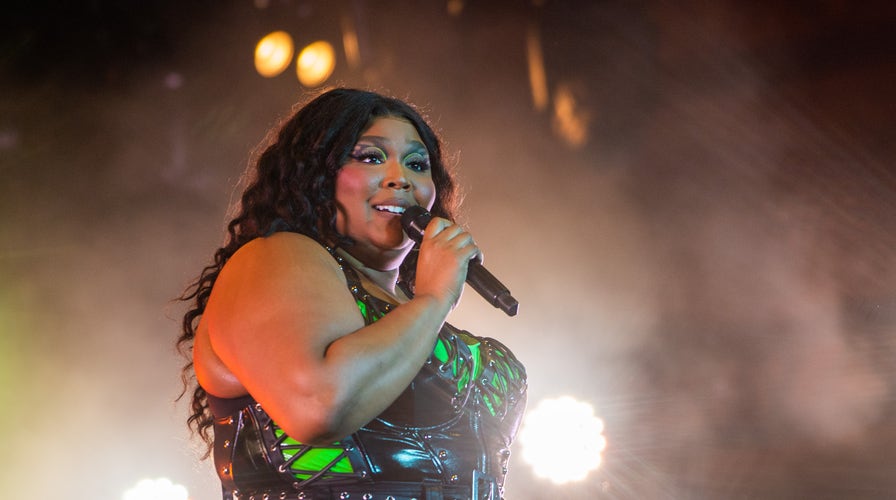 Lizzo walks the red carpet at the 2023 Grammy Awards