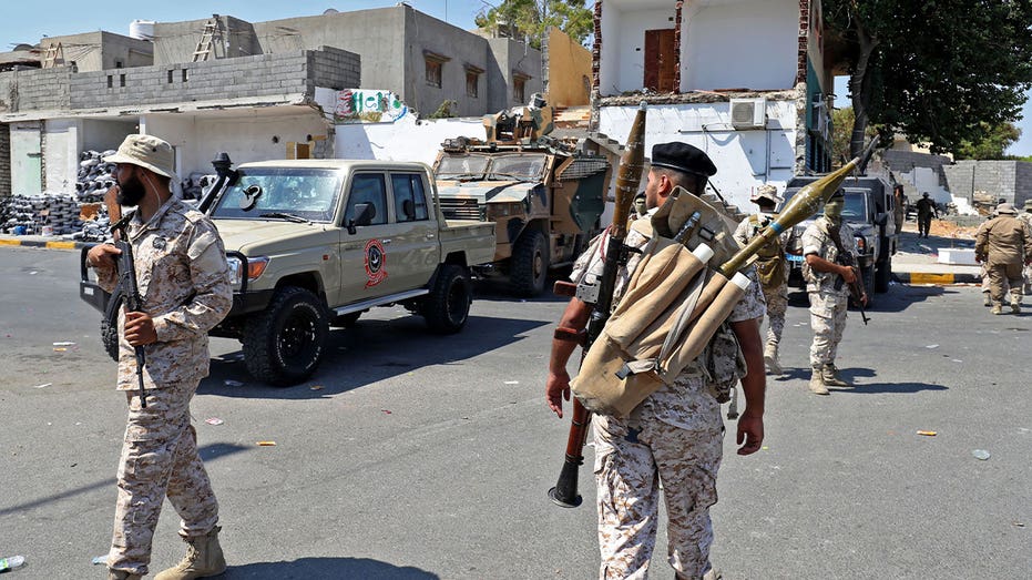 Intense clashes between militias in Libya leave residents trapped in homes