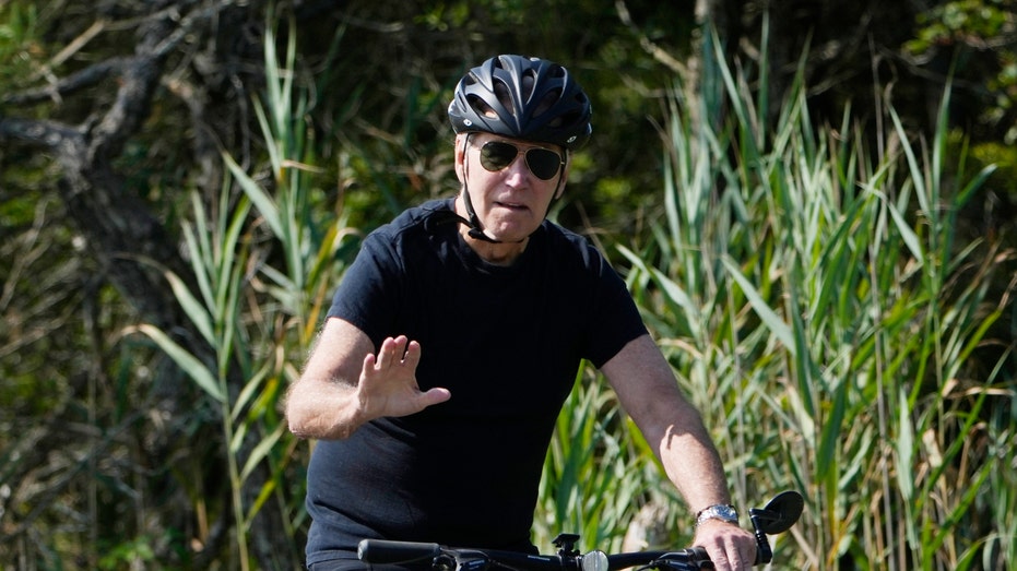 Biden takes leisurely bike ride at Delaware vacation home as Hunter Biden scandal surges