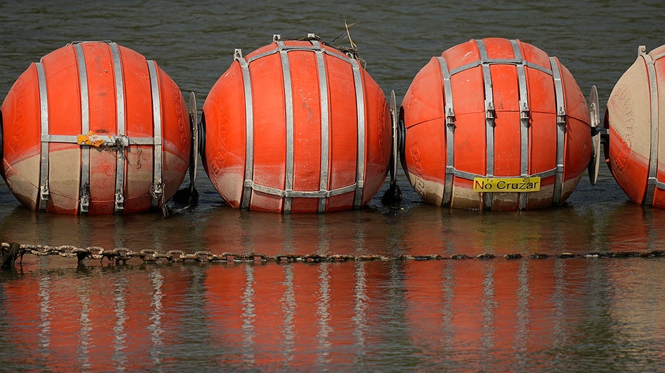 Judge orders Texas to remove floating buoys used to curb flow of illegal immigrants