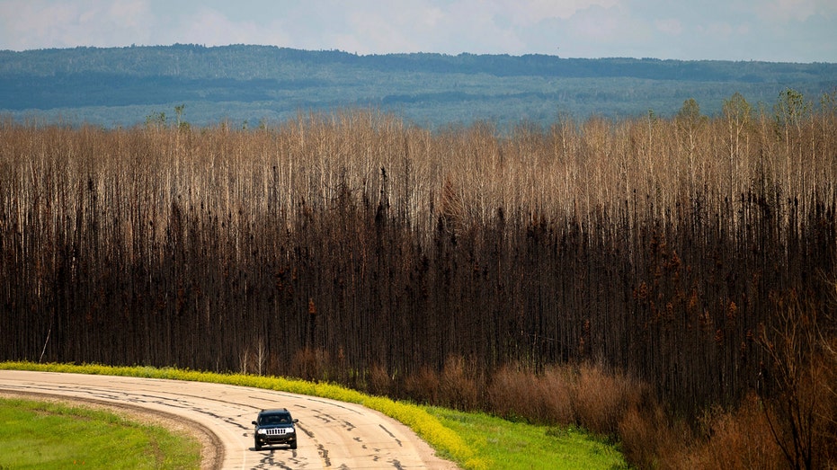 Canadian military responds to wildfires threatening the Northwest Territories, airlifting residents to safety