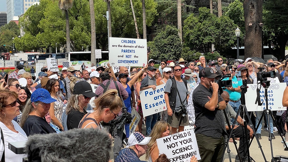 Parental rights protesters battle backers of Calif school policy to hide gender identity from parents