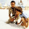 Roy Scheider and Marc Gilpin on the beach in "Jaws 2"