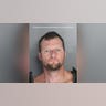 A mugshot of Michael Williams