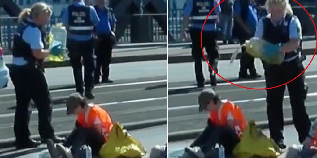 German police officer accused of dumping oil on radical climate protesters that blocked, glued hands to road - Vimarsana News