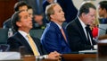 Texas state Attorney General Ken Paxton, center, sits with his attorneys Dan Cogdell, right, and Tony Buzbee, left, during his impeachment trial in the Senate Chamber at the Texas Capitol, Tuesday, Sept. 5, 2023, in Austin, Texas.