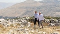 Highway 3: The former Trump administration officials walk on Mount Eybal in Samaria.