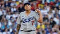 Pitcher Julio Urias #7 of the Los Angeles Dodgers stands on the mound after giving up a three-run home run to the Boston Red Sox during the sixth inning at Fenway Park on August 26, 2023 in Boston, Massachusetts.