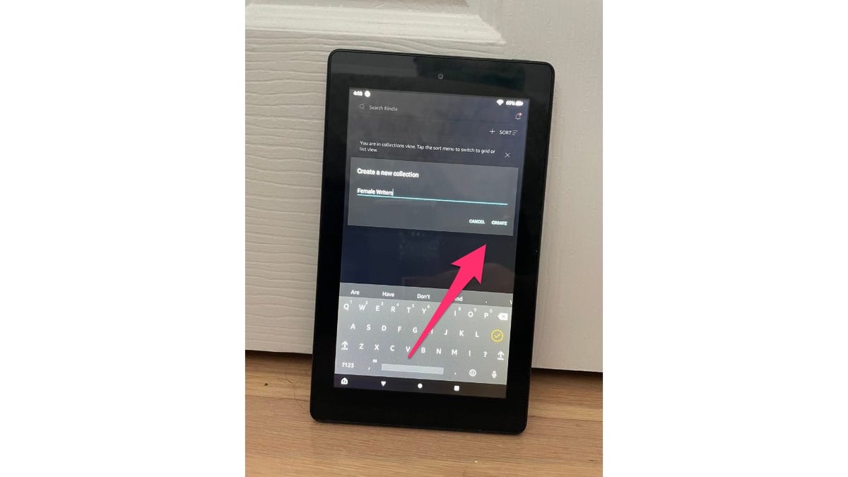 Red arrow pointing to create option on Amazon Kindle once you name your collection