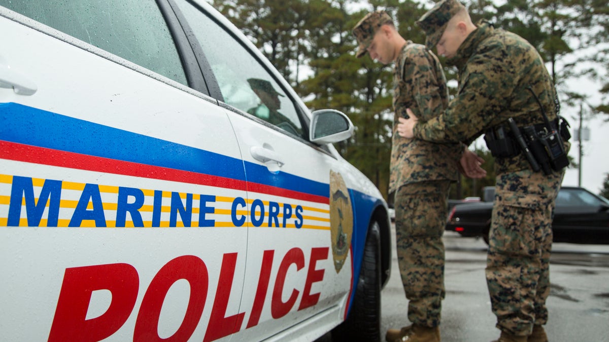 Marine MPs and police cruiser