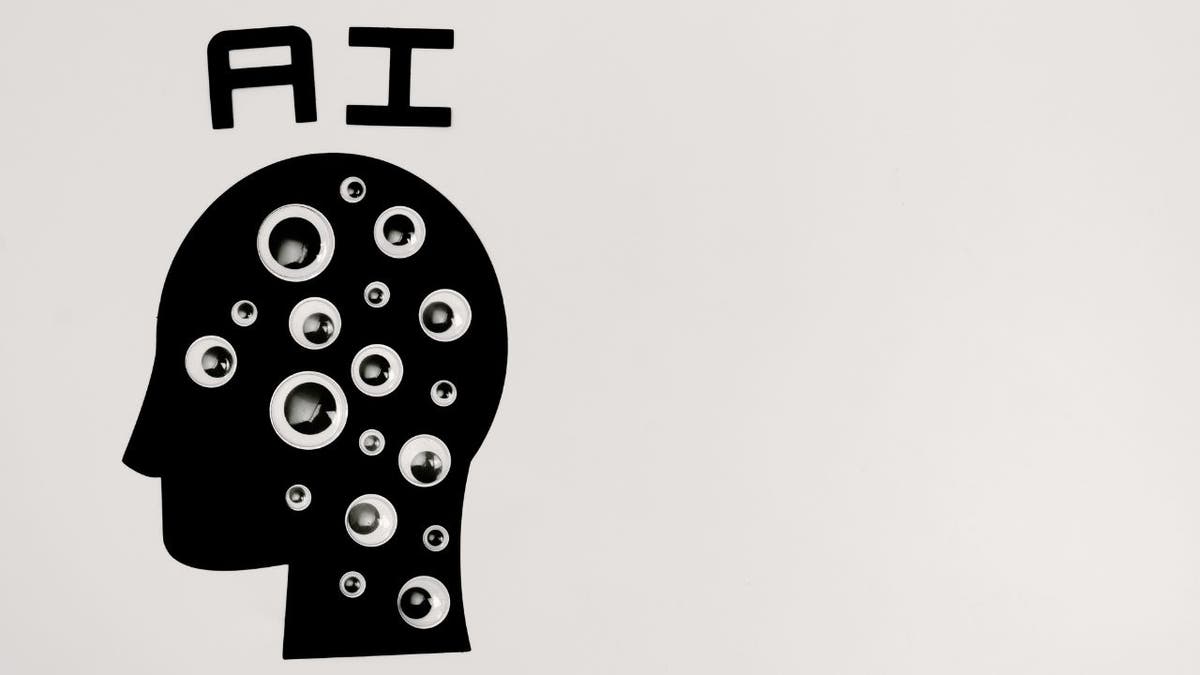 Head silhouette with eyes and letters "A.I." on the head.