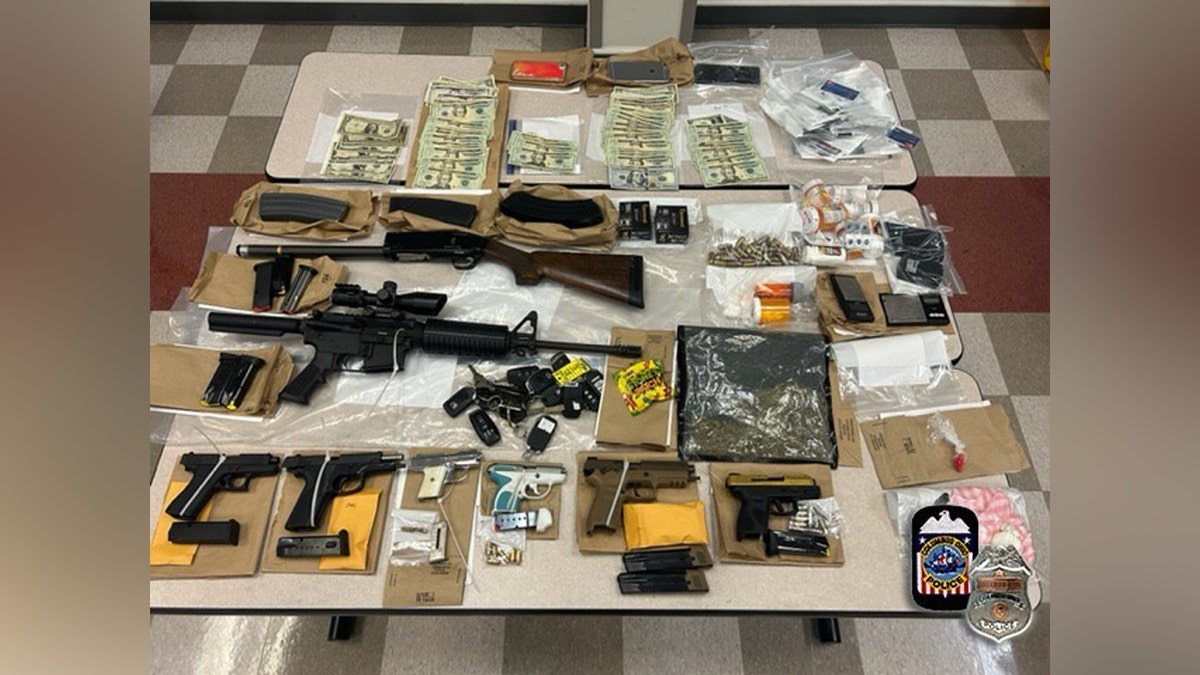 Recovered firearms, drugs and other items on display