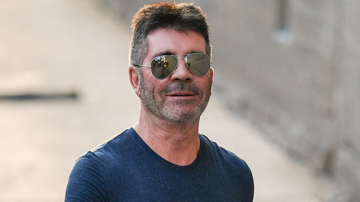 Simon Cowell in glasses