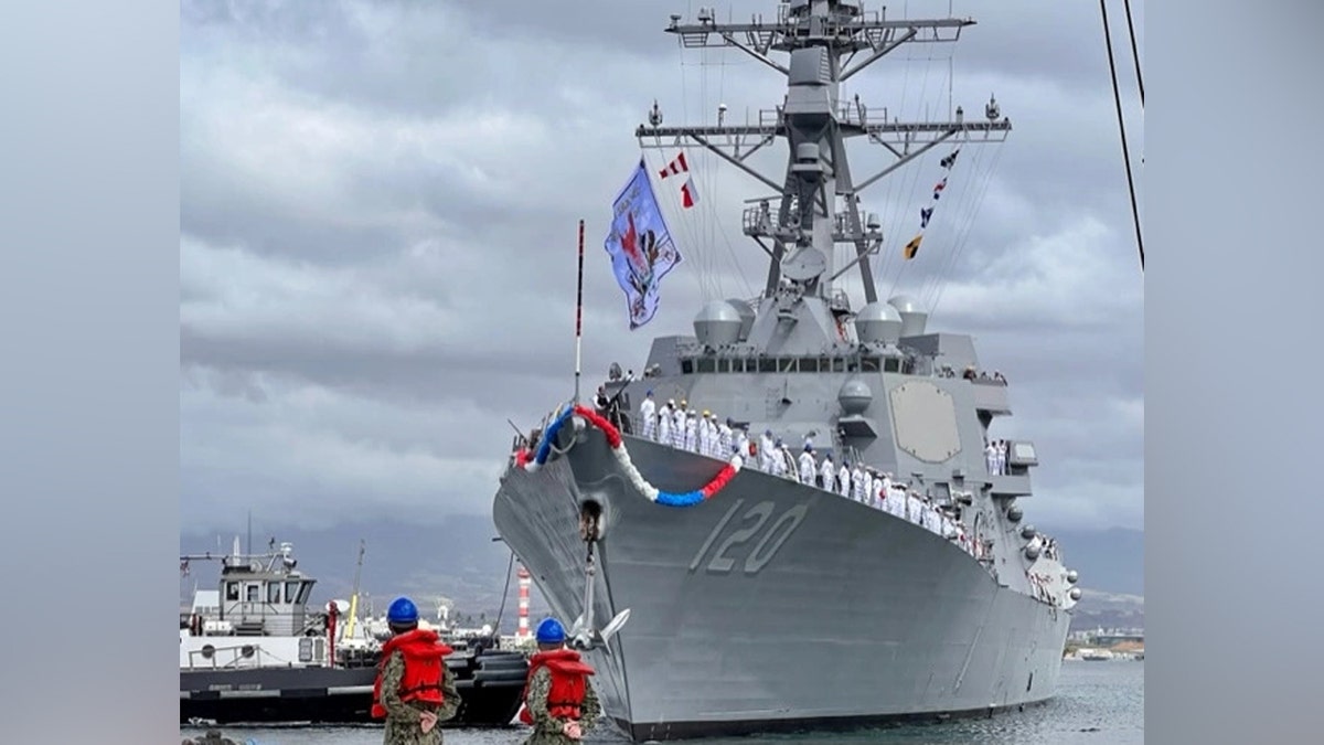 USS Carl M. Levin ship with flag