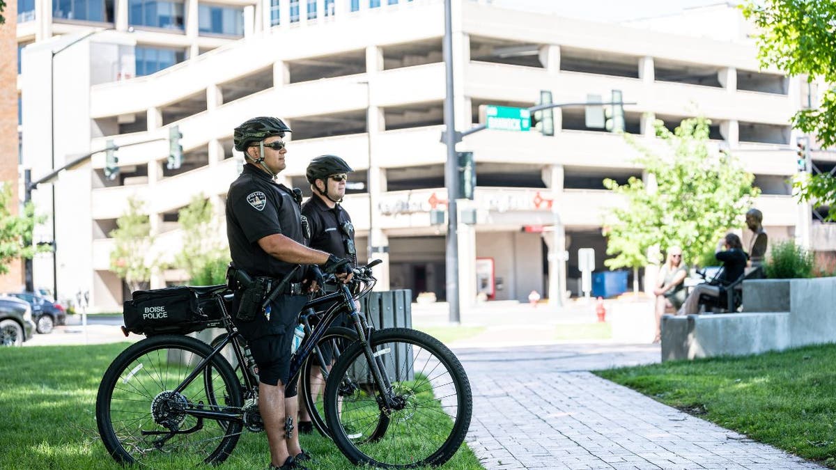 Two officers on bicycles.